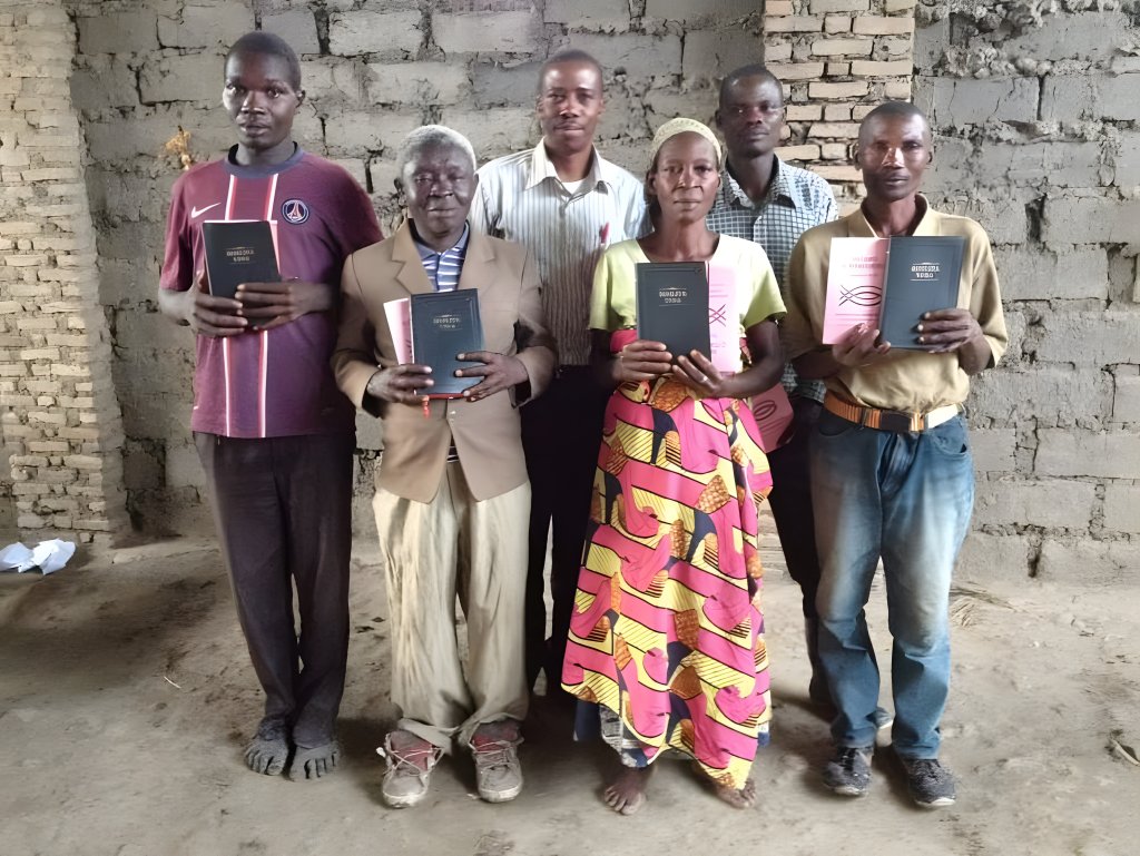 Adults with Bibles at a spiritual gathering